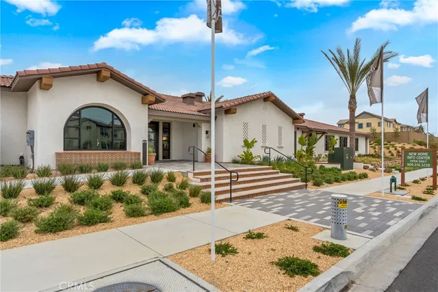 a view of a street with a building in the background