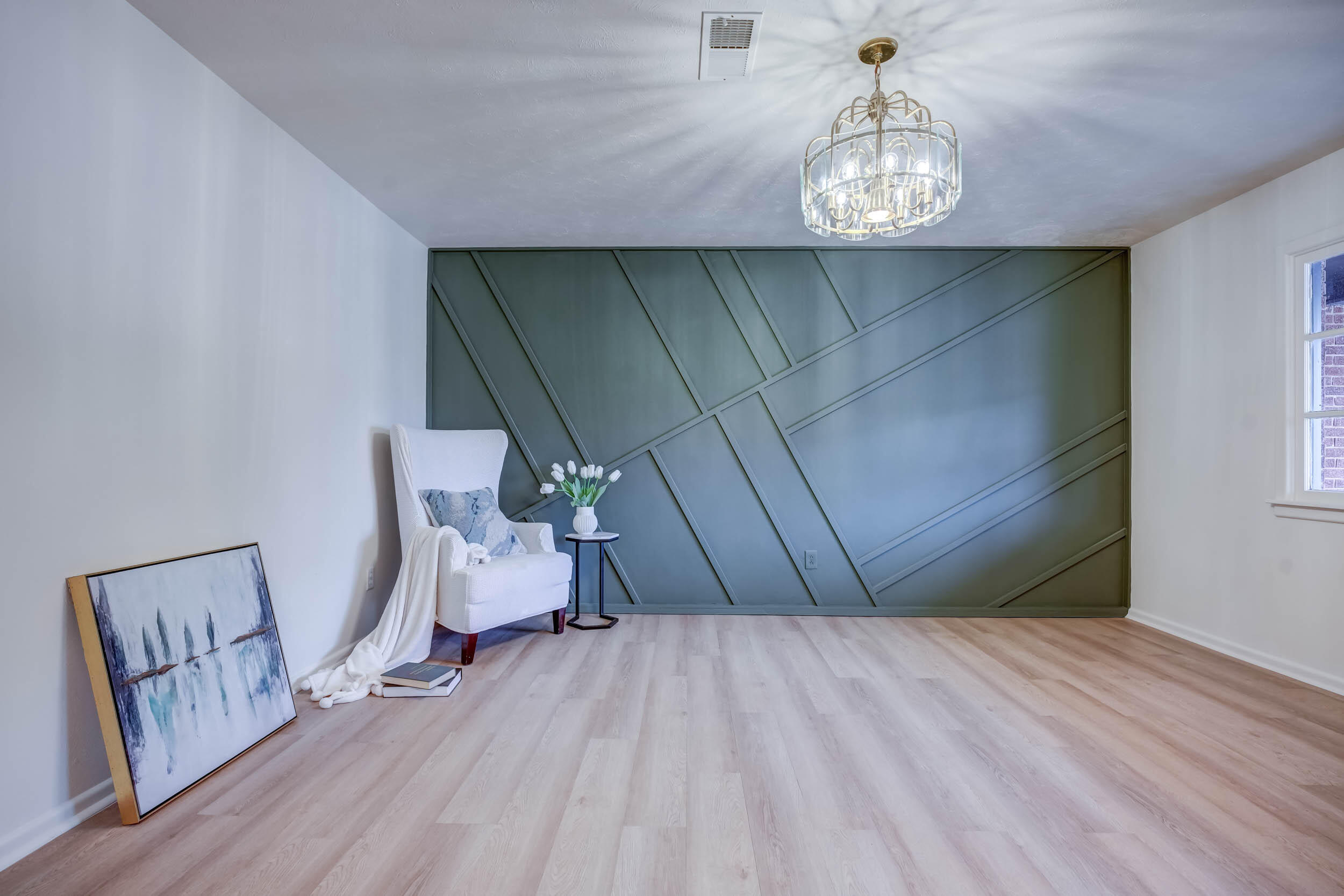 2101 64th Street Lubbock, TX 79412 - Photo 9 of 30 a view of an empty room and wooden floor