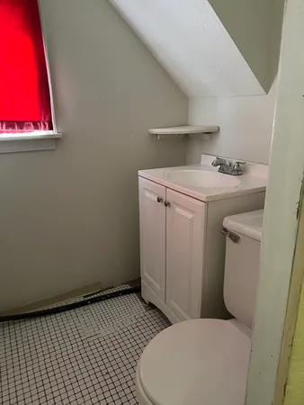 a view of a room with a window