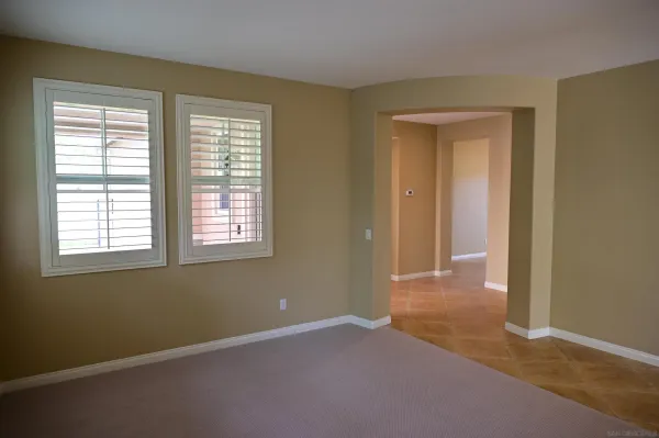 an empty room with windows