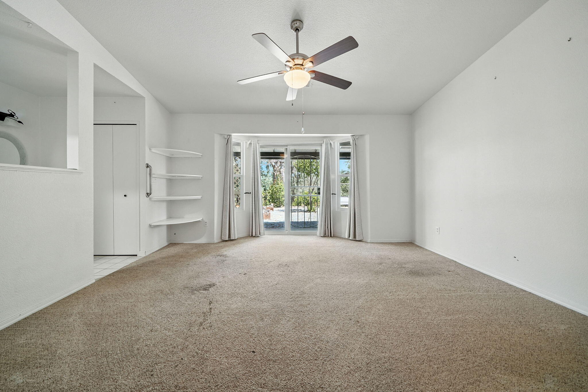 3588 Magnums Way Redding, CA 96003 - Photo 12 of 35 a view of an empty room with a window