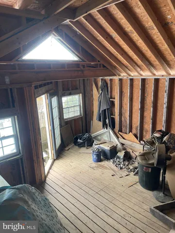 a view of a room with lots of car parked