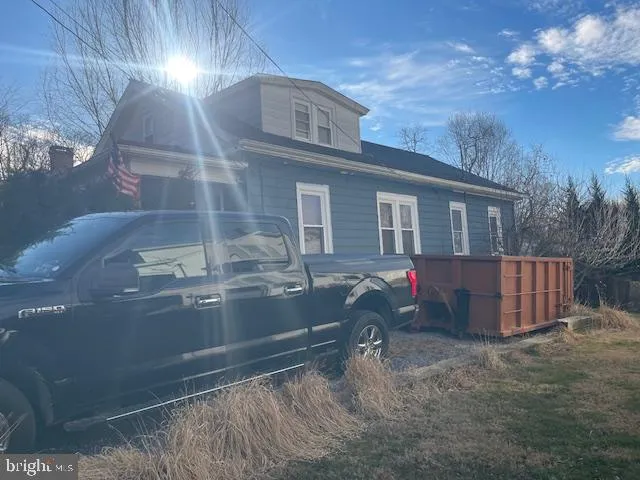 a view of a backyard of the house