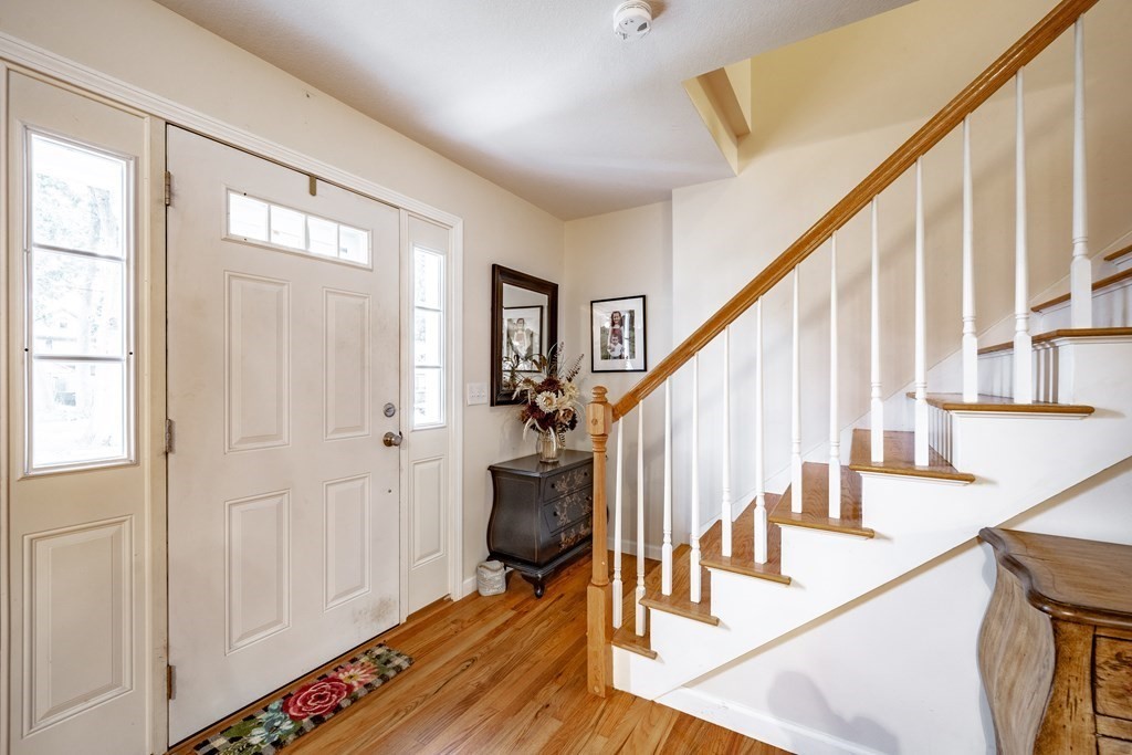 79 Judson Street Springfield, MA 01104 - Photo 21 of 38 a view of an entryway with wooden floor and staircase