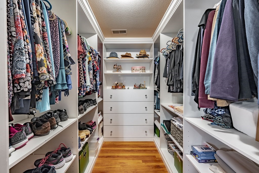 79 Judson Street Springfield, MA 01104 - Photo 33 of 38 a view of walk in closet with clothes and shoes