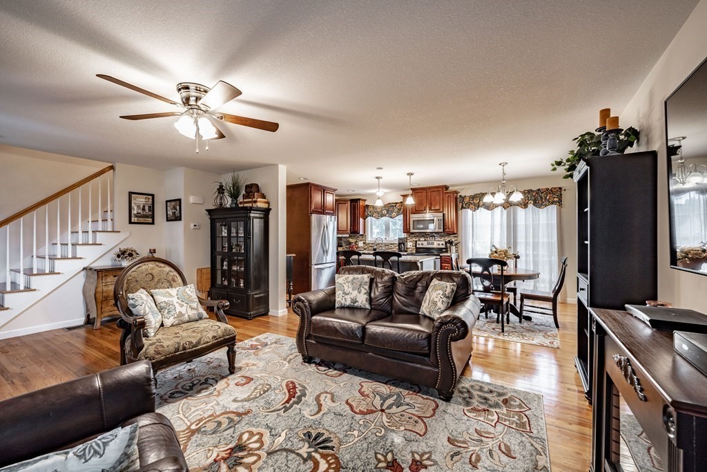 79 Judson Street Springfield, MA 01104 - Photo 7 of 38 a living room with furniture ceiling fan and a rug