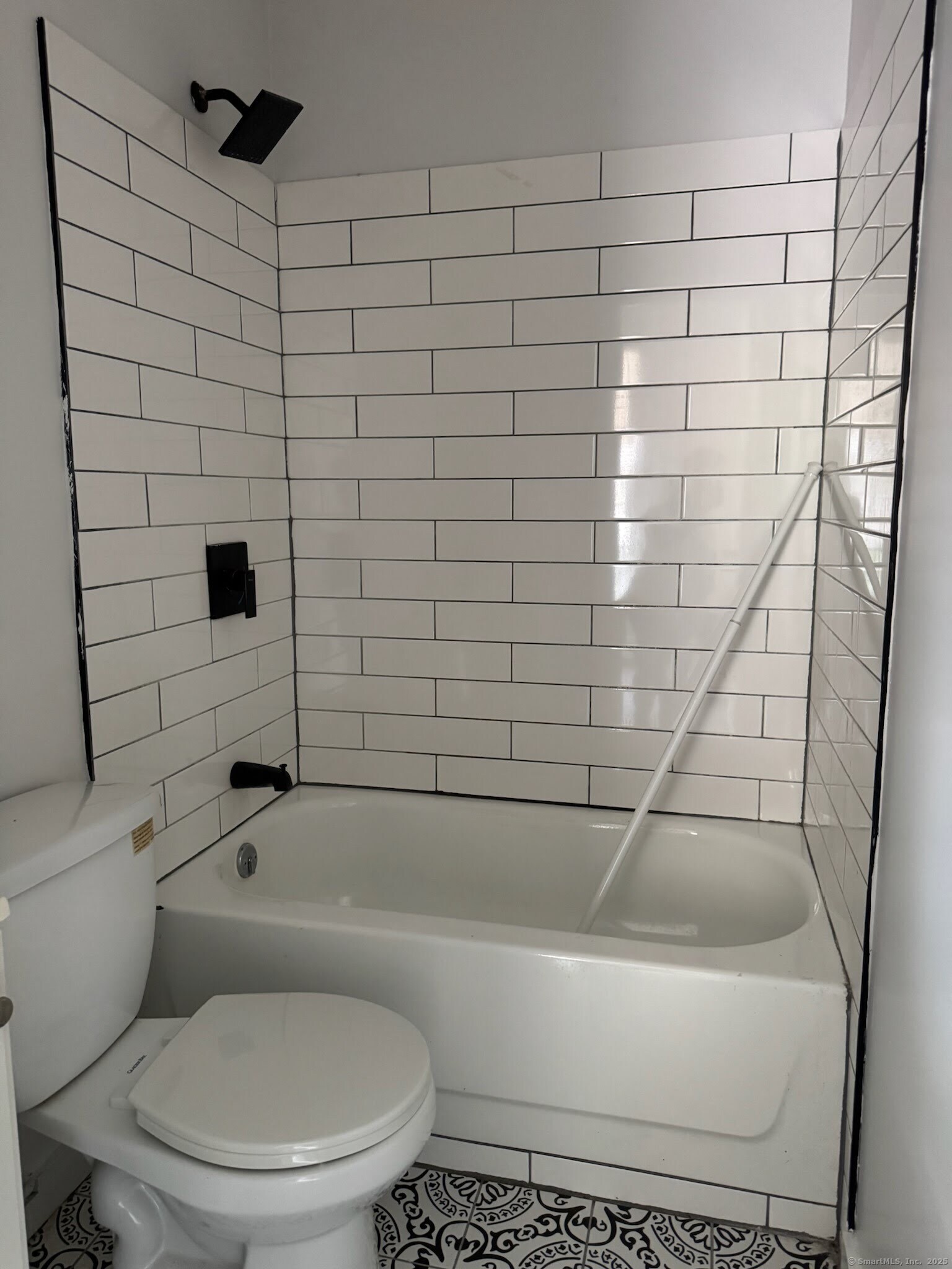 81 West Main Street, Unit 8 Meriden, CT 06451 - Photo 4 of 4 a bathroom with a toilet and a shower