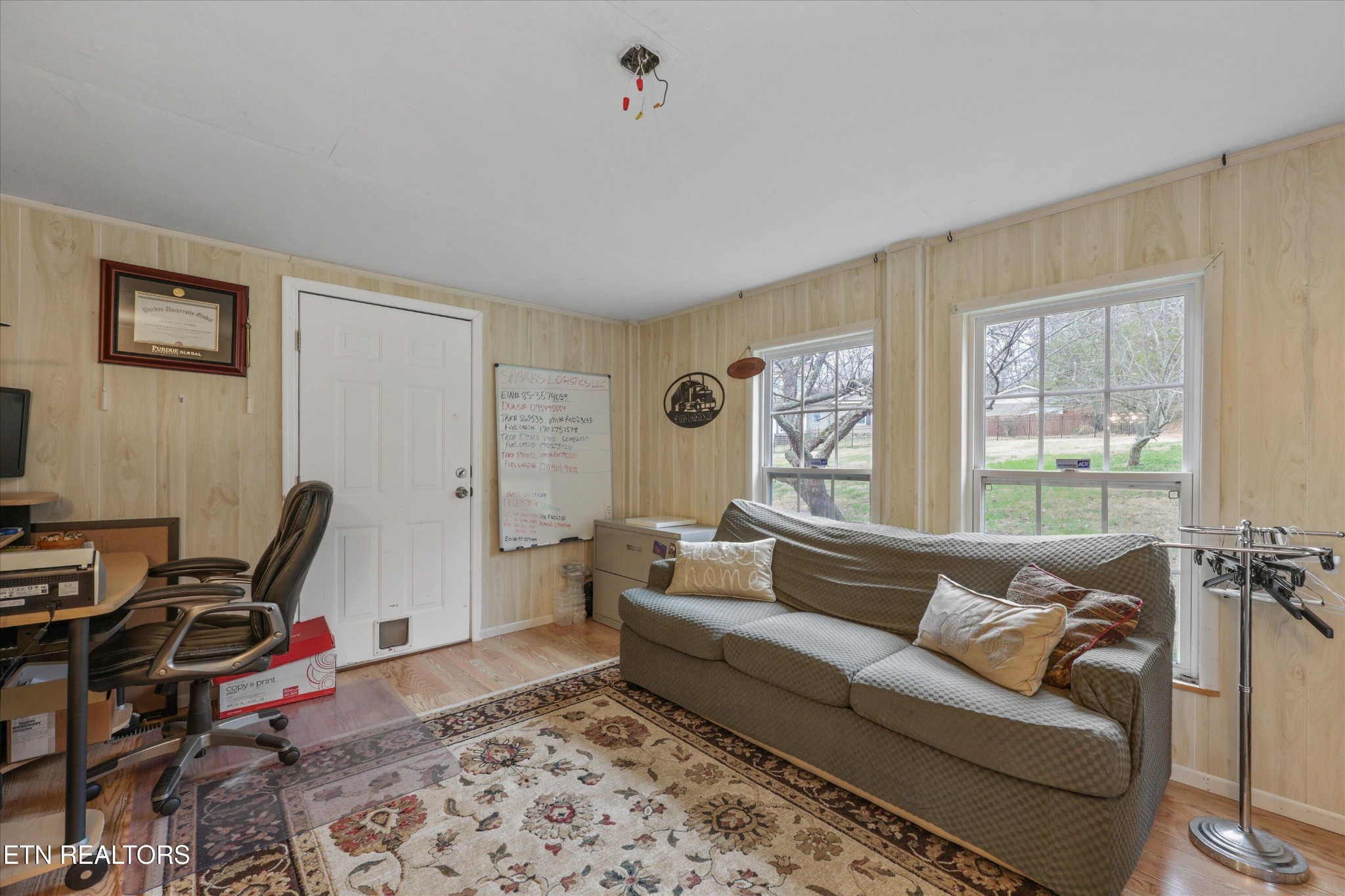 222 Mealer Road Lenoir City, TN 37771 - Photo 18 of 29 a living room with furniture and a window