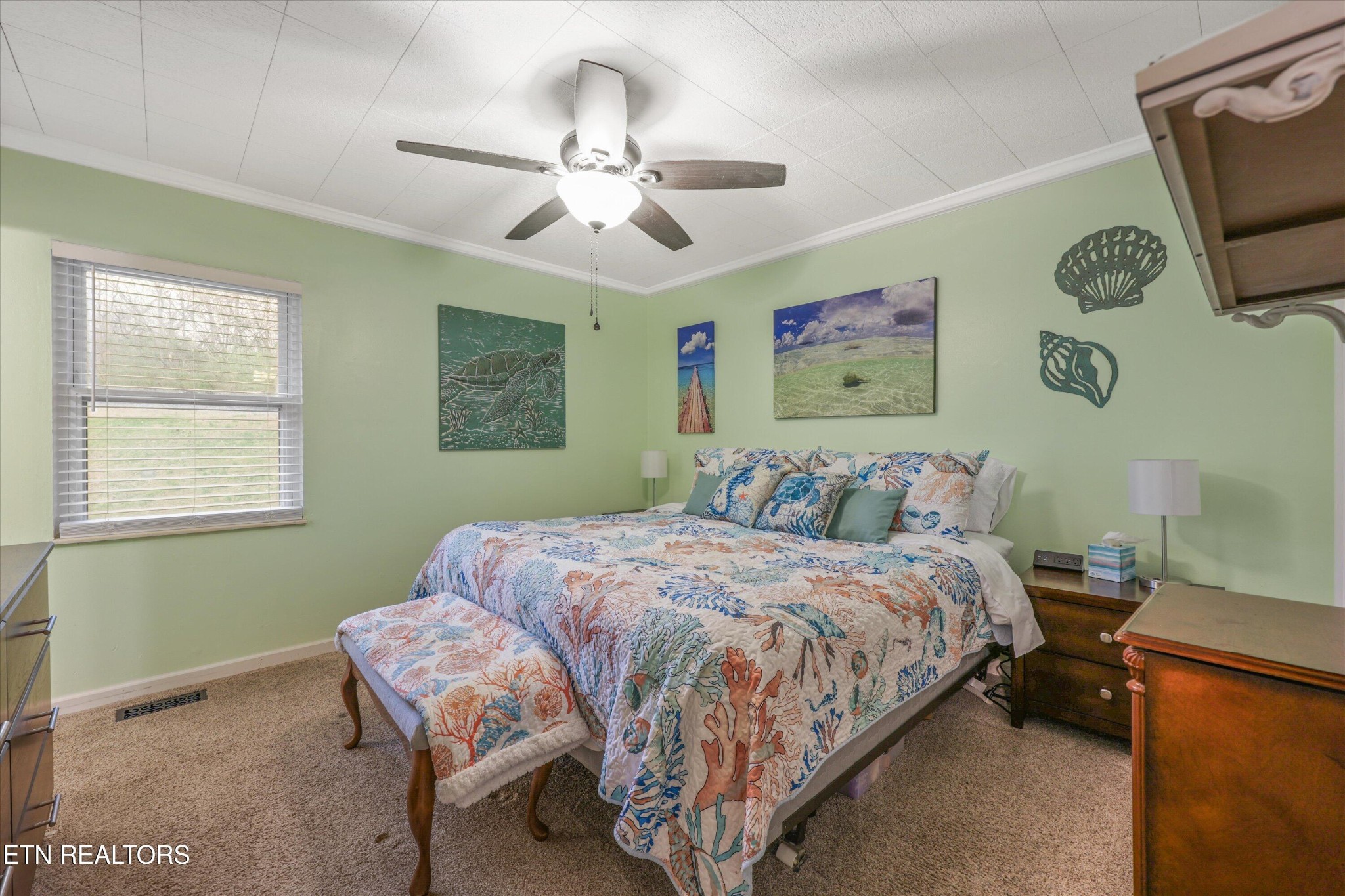 222 Mealer Road Lenoir City, TN 37771 - Photo 20 of 29 a bedroom with a bed and ceiling fan