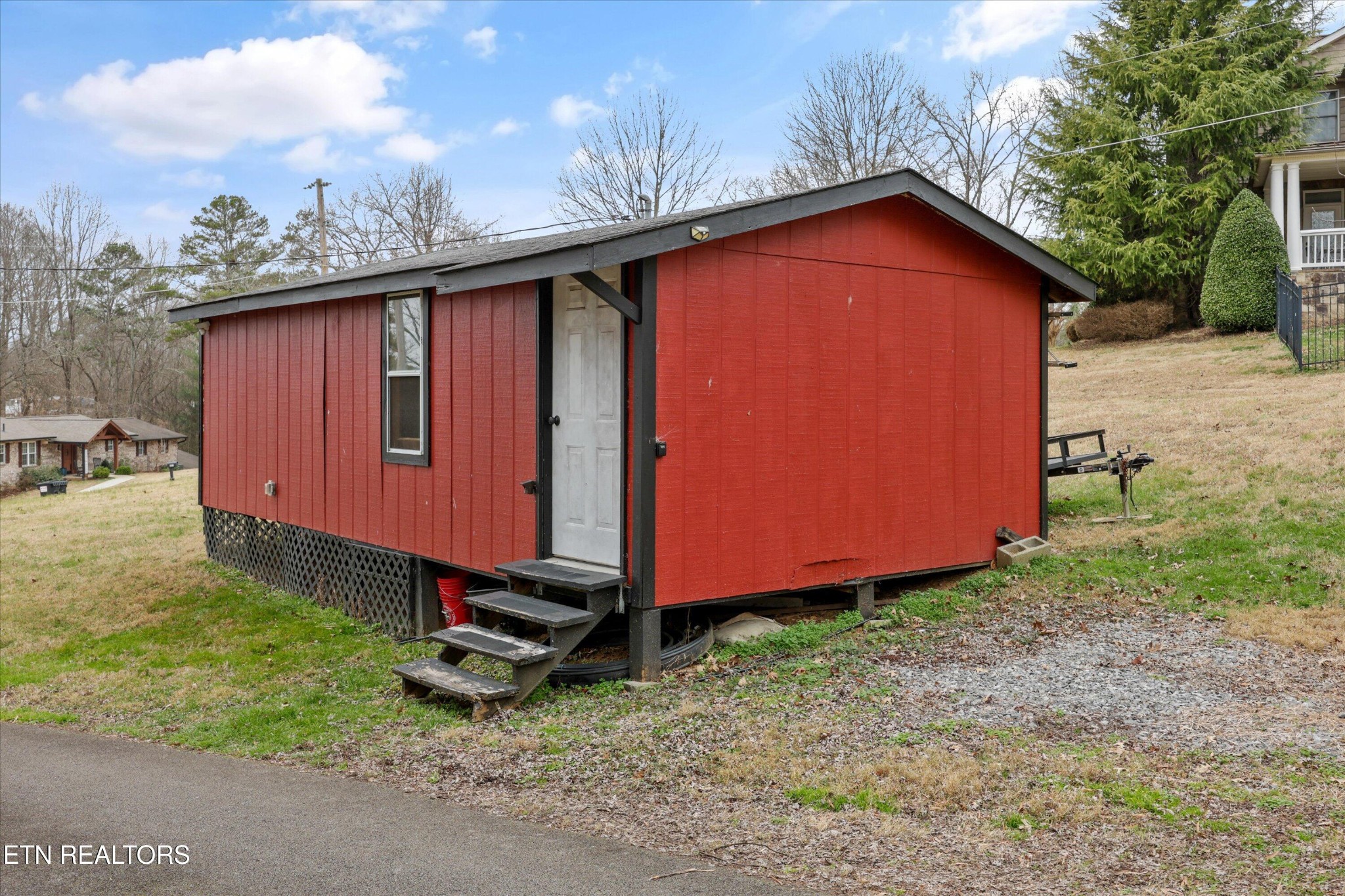 222 Mealer Road Lenoir City, TN 37771 - Photo 26 of 29 a backyard of a house with tub and trees