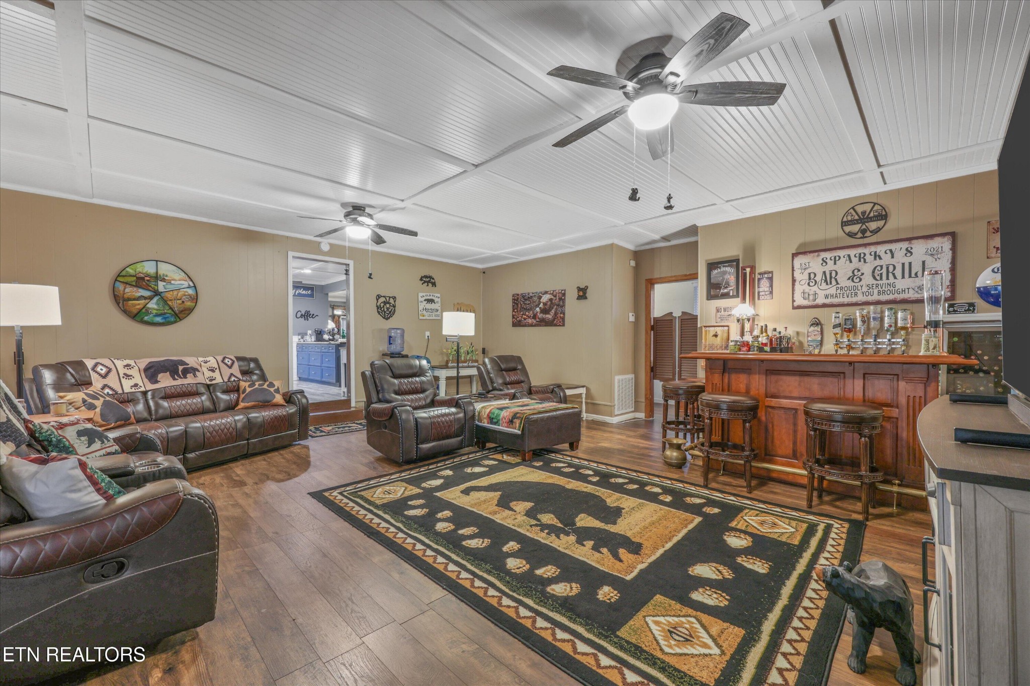 222 Mealer Road Lenoir City, TN 37771 - Photo 5 of 29 a living room with lots of furniture and a rug