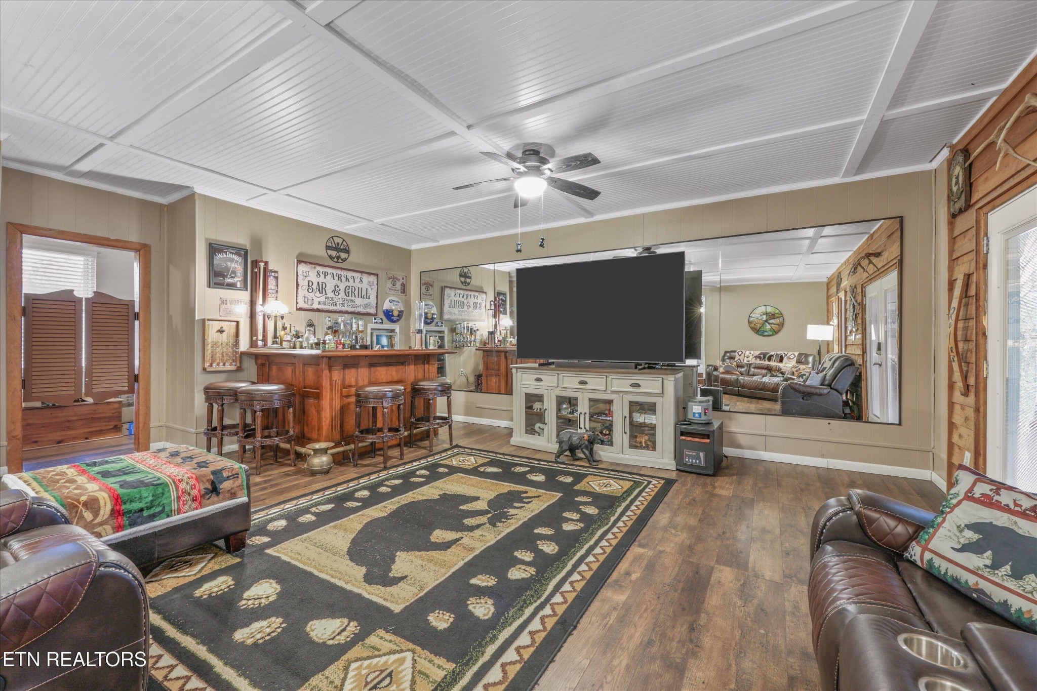 222 Mealer Road Lenoir City, TN 37771 - Photo 8 of 29 a living room with furniture and a flat screen tv