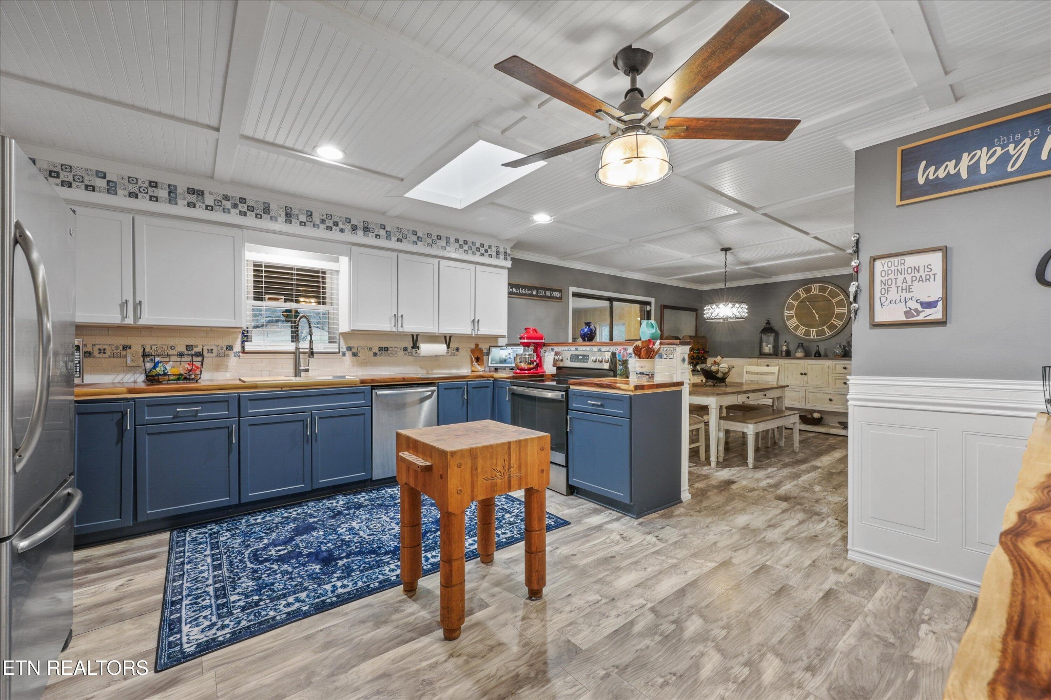 222 Mealer Road Lenoir City, TN 37771 - Photo 10 of 29 a kitchen with a refrigerator a stove a sink and chairs