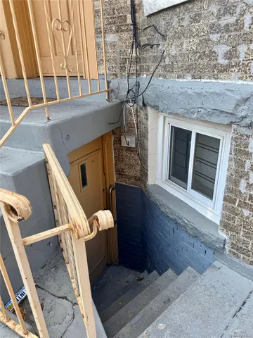 a kitchen with stainless steel appliances granite countertop a stove and cabinets