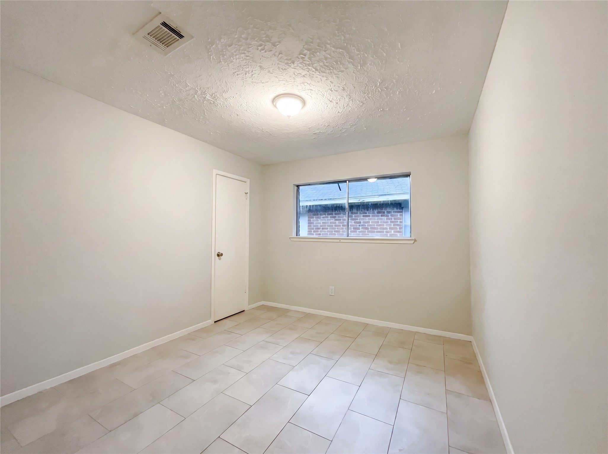 23110 Pennsgrove Road Spring, TX 77373 - Photo 11 of 16 an empty room with a bench