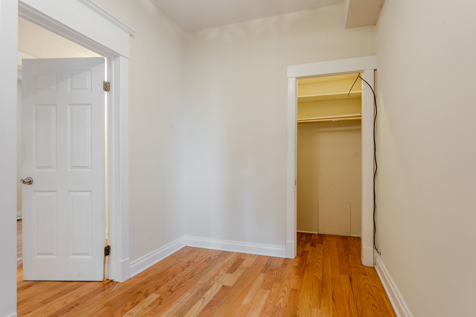 Undisclosed Address Chicago, IL 60614 - Photo 14 of 27 a view of empty room with wooden floor