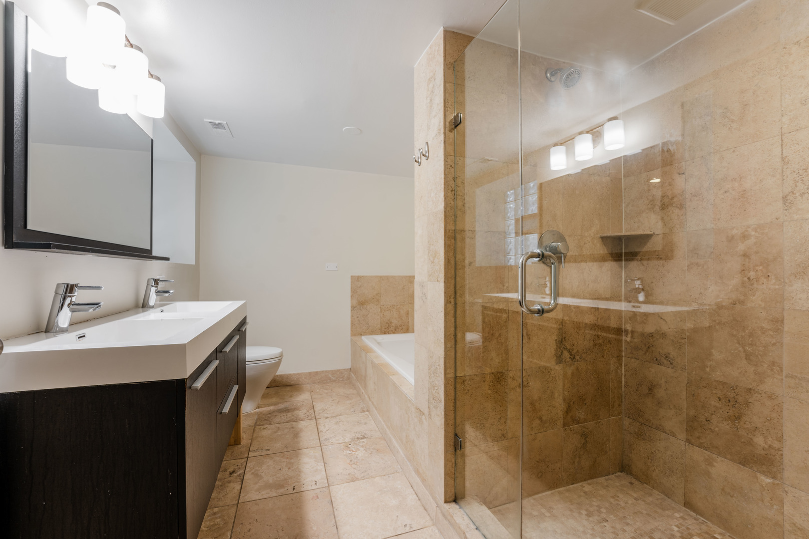 Undisclosed Address Chicago, IL 60614 - Photo 21 of 27 a bathroom with a sink a toilet and shower