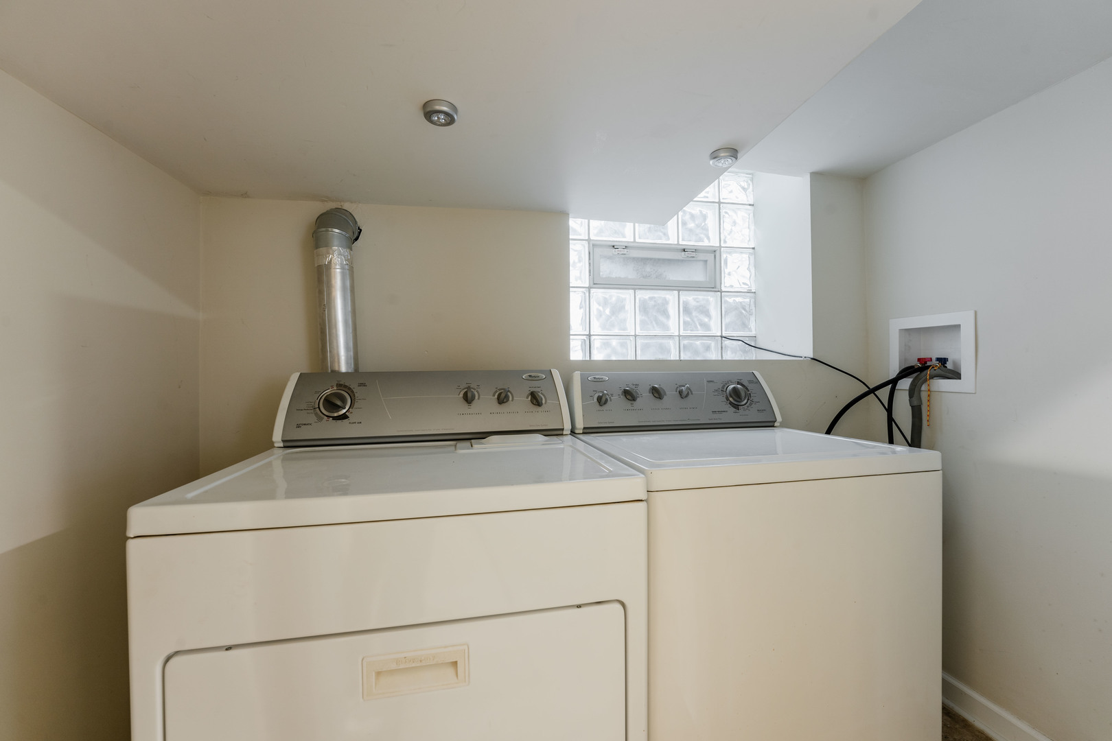 Undisclosed Address Chicago, IL 60614 - Photo 27 of 27 a utility room with dryer and washer