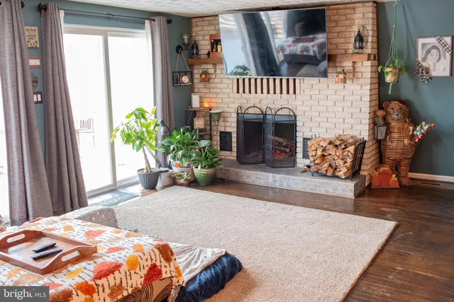 a bedroom with bed and a window