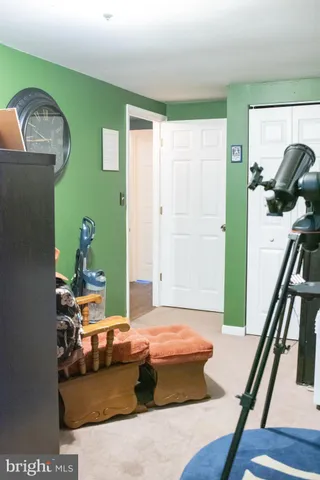 a bathroom with a toilet a sink and shower