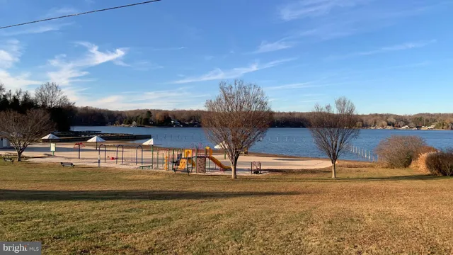 a view of a backyard of the house