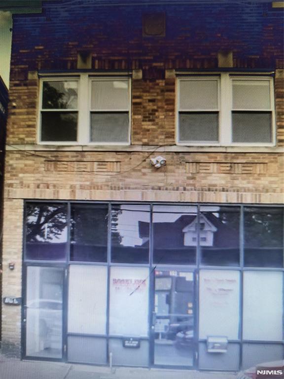 a bathroom with a sink and a microwave