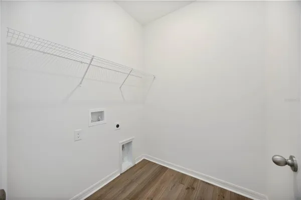 a view of a room with racks on the wall