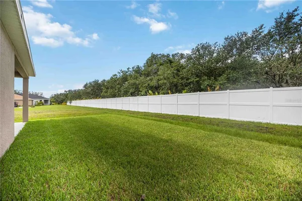 a view of outdoor space and yard