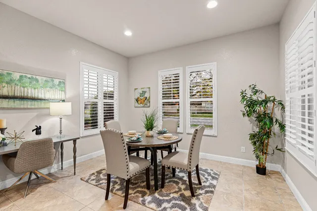 a bedroom with furniture and a chandelier