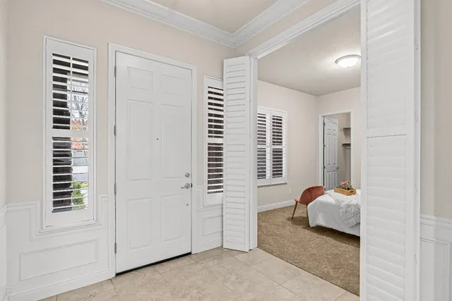 a bathroom with a tub sink shower and mirror