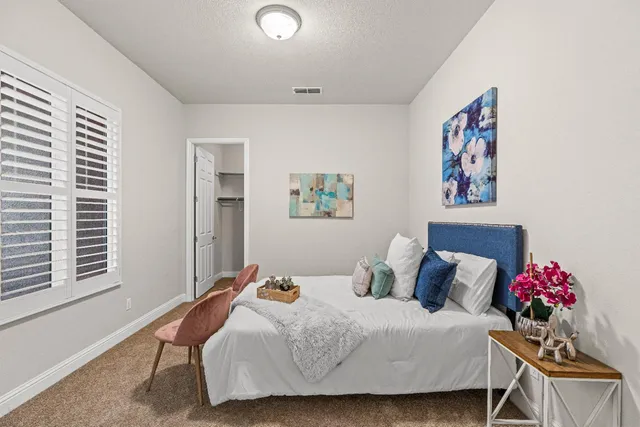 a view of an empty walk in closet