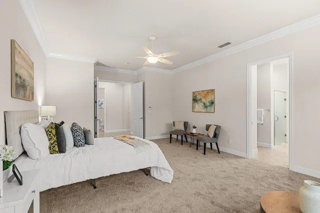 an aerial view of a residential houses with outdoor space and street view