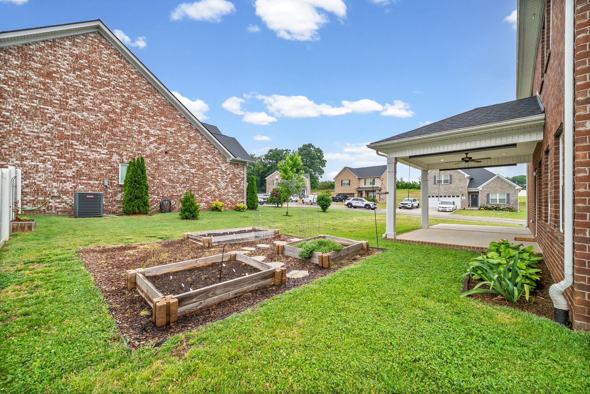 719 Reflections Lane Pleasant View, TN 37146 - Photo 38 of 46 a view of a backyard with sitting area