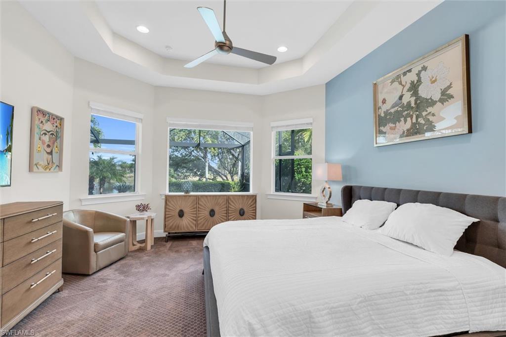 5769 Anegada Drive Naples, FL 34113 - Photo 23 of 45 a bed room with a bed and a large window