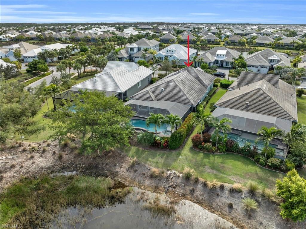 5769 Anegada Drive Naples, FL 34113 - Photo 34 of 45 an aerial view of multiple house