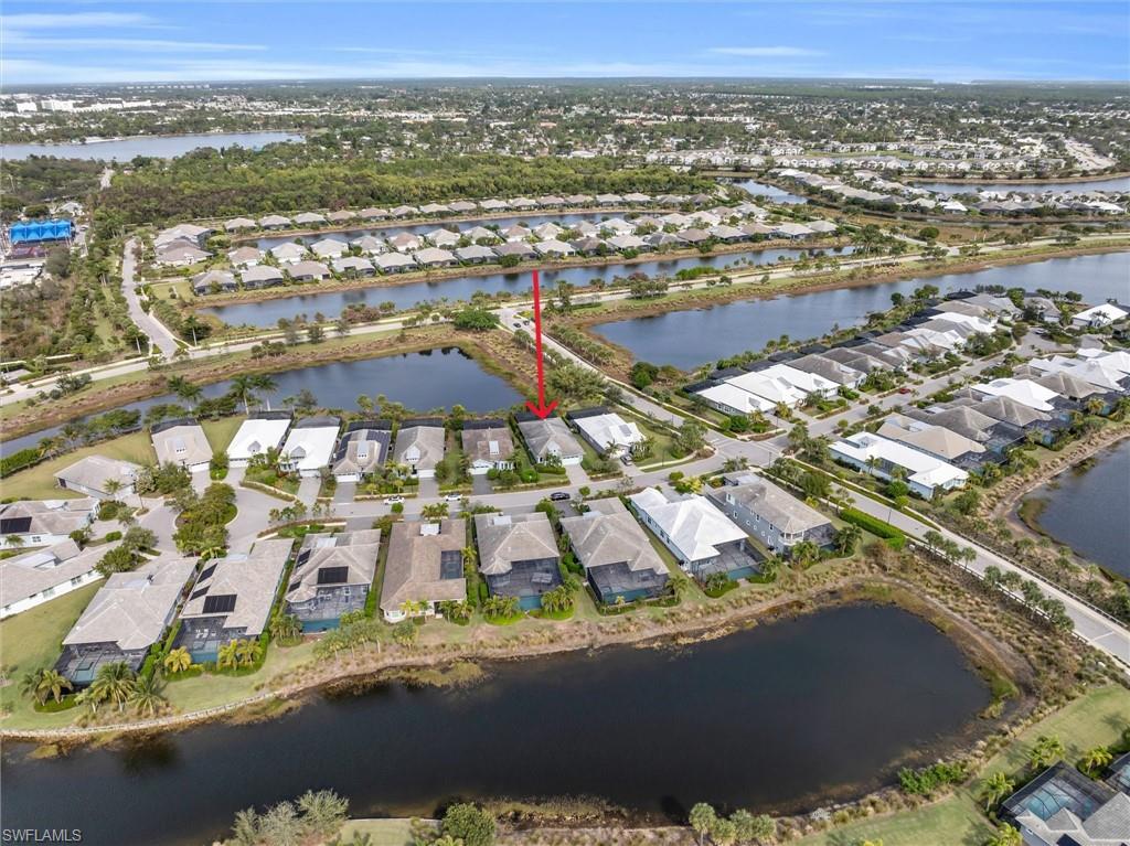 5769 Anegada Drive Naples, FL 34113 - Photo 35 of 45 an aerial view of residential houses with outdoor space