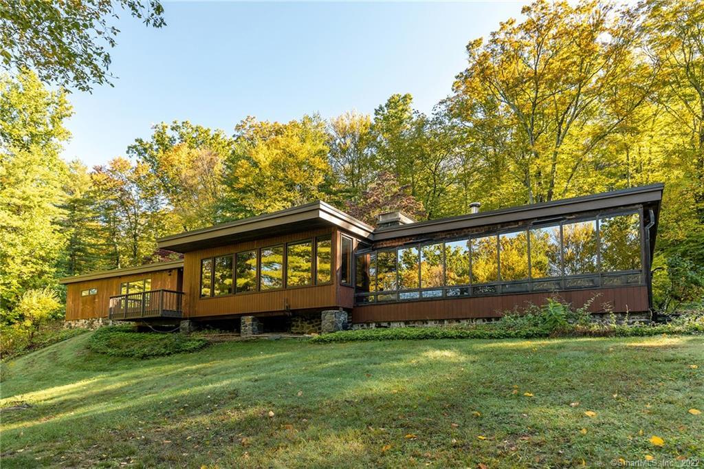 120 Whitcomb Hill Road Cornwall, CT 06754 - Photo 1 of 1 a front view of a house with a garden