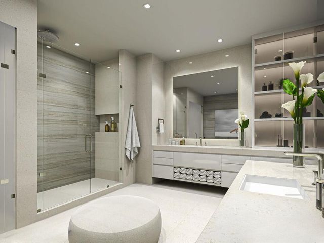 a bathroom with a double vanity sink and a mirror