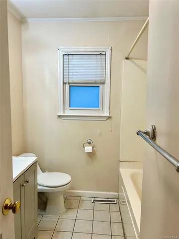 a bathroom with a toilet