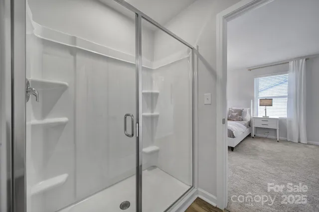 a bathroom with a sink and shower