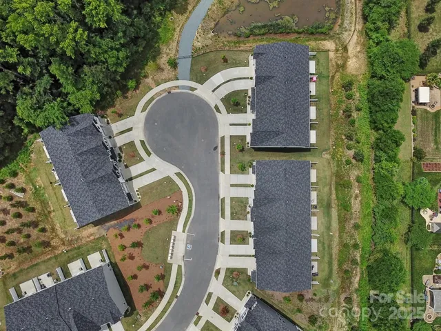 aerial view of a house with a swimming pool
