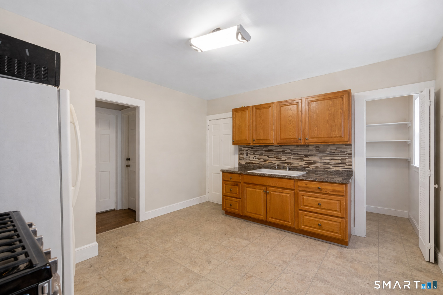 744 Park Street Bridgeport, CT 06608 - Photo 13 of 21 a room with an entryway