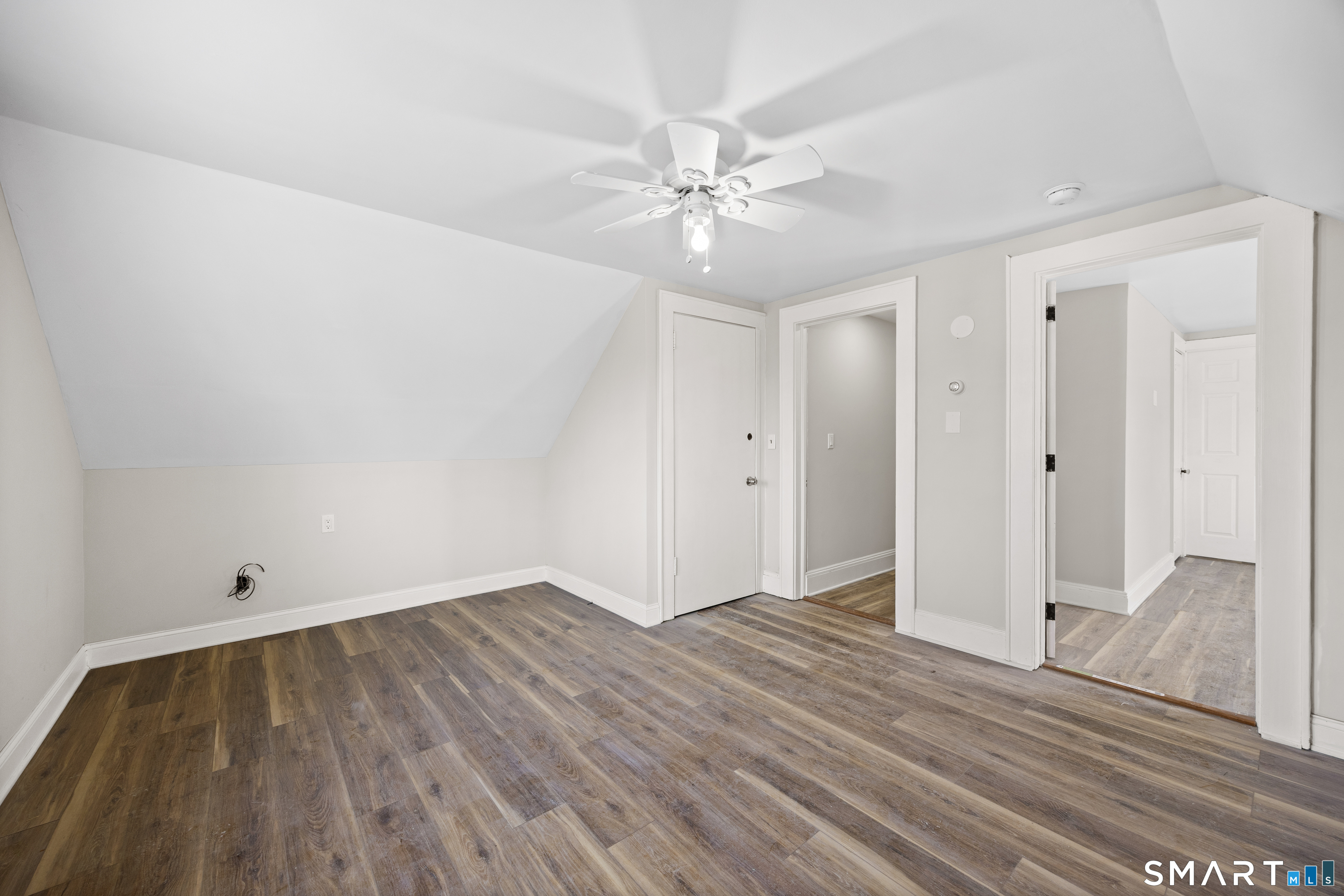 744 Park Street Bridgeport, CT 06608 - Photo 16 of 21 a view of an empty room and wooden floor