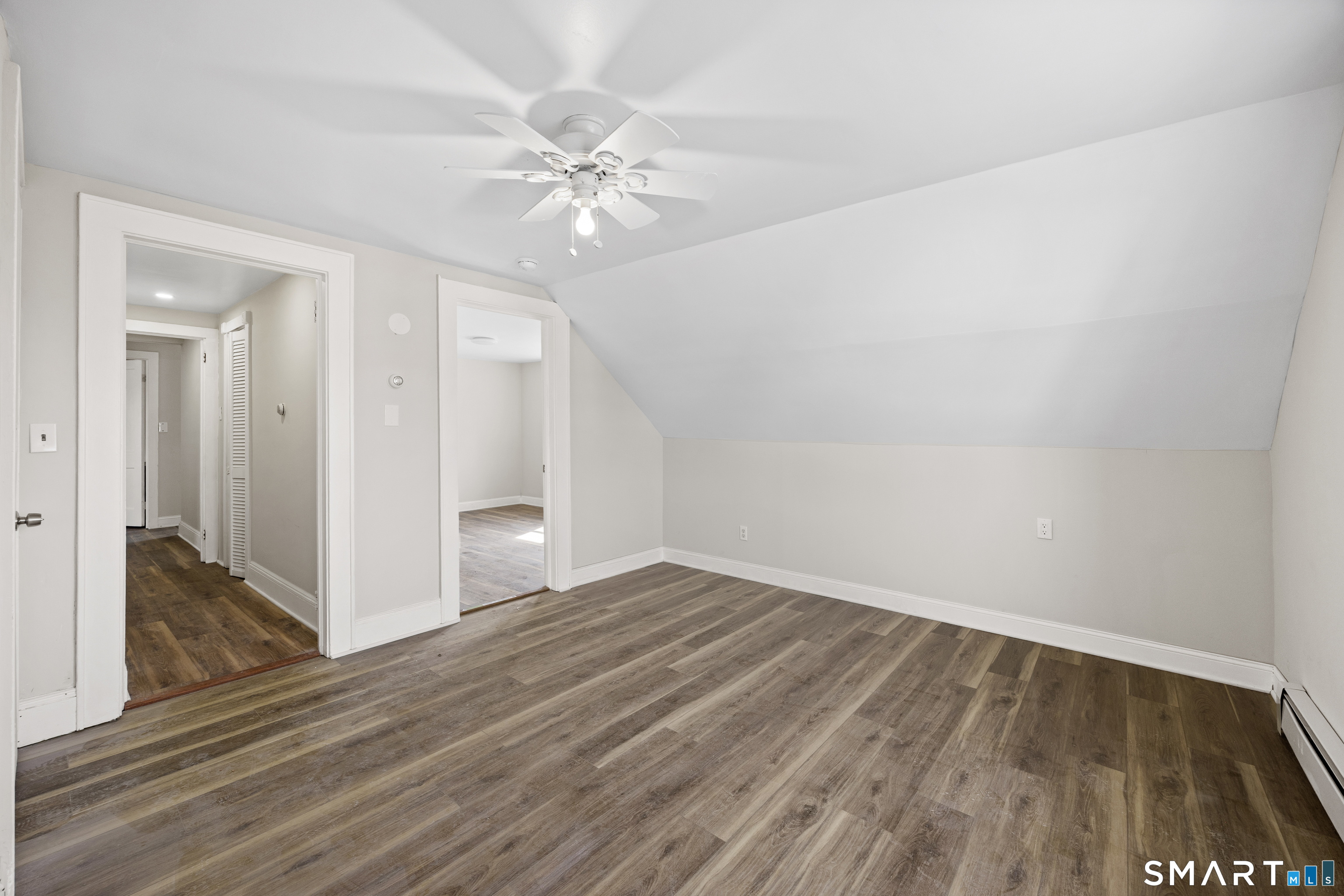 744 Park Street Bridgeport, CT 06608 - Photo 20 of 21 a view of an empty room and wooden floor
