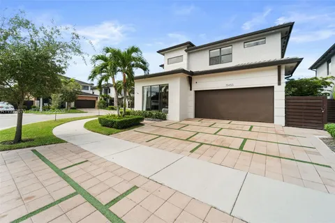 a front view of a house with yard