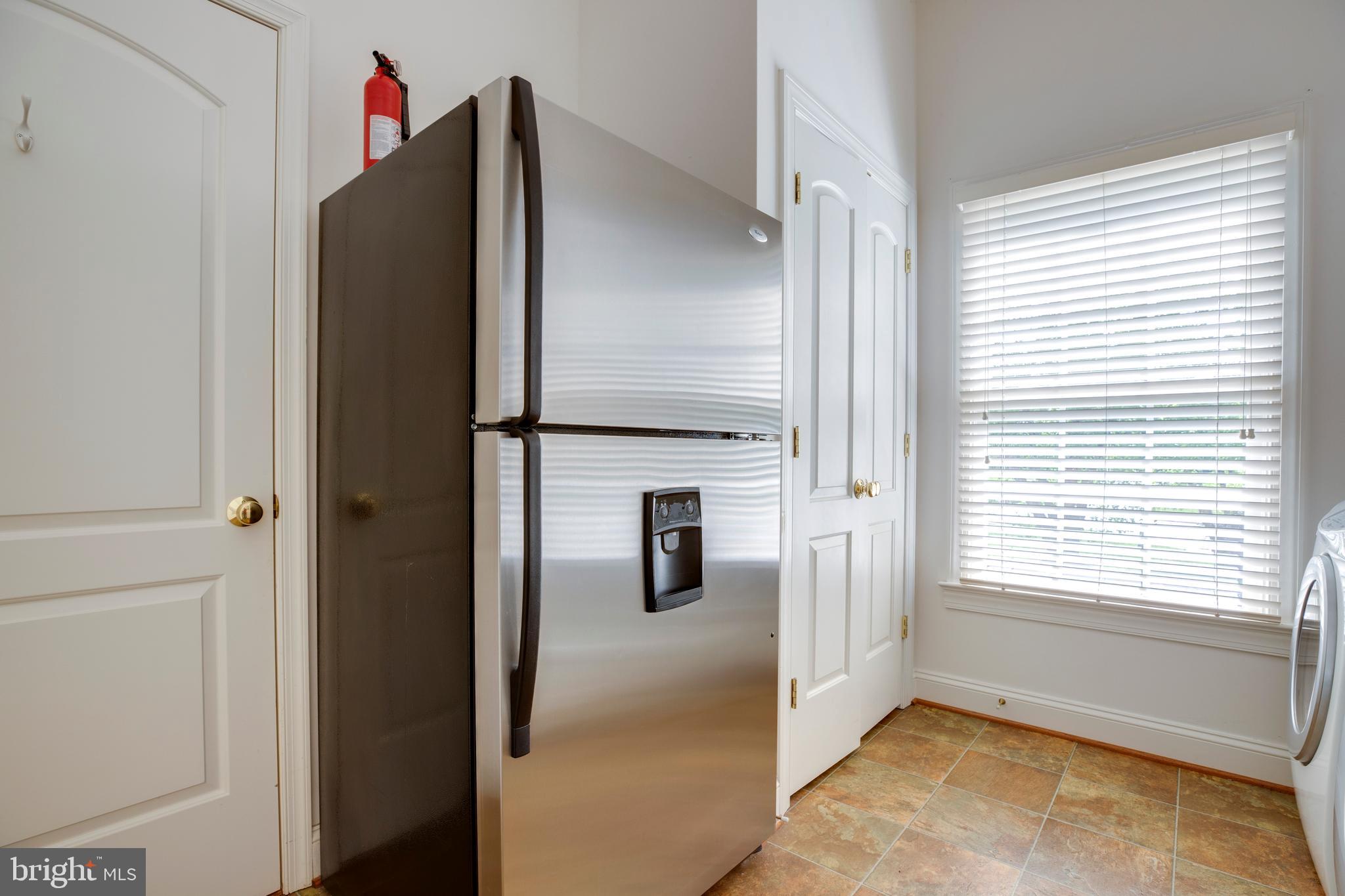 8277 Roxborough Loop Gainesville, VA 20155 - Photo 32 of 85 a bathroom with a shower and a window