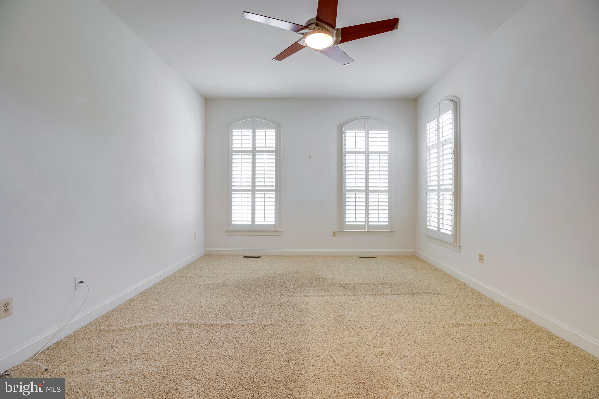 8277 Roxborough Loop Gainesville, VA 20155 - Photo 35 of 85 a view of an empty room with a window