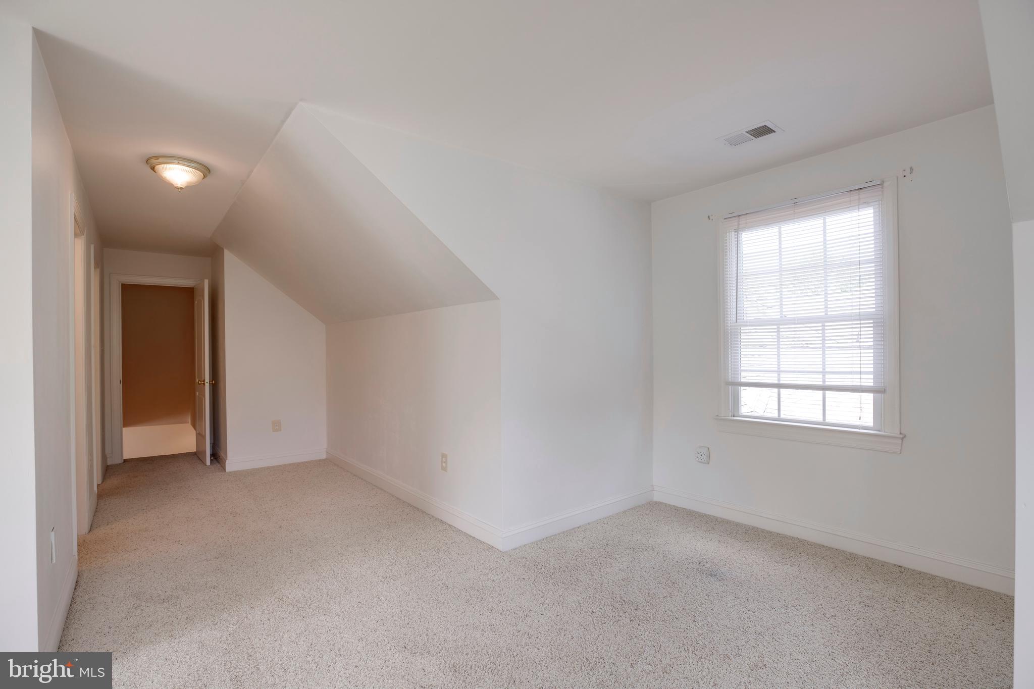 8277 Roxborough Loop Gainesville, VA 20155 - Photo 46 of 85 an empty room with a window
