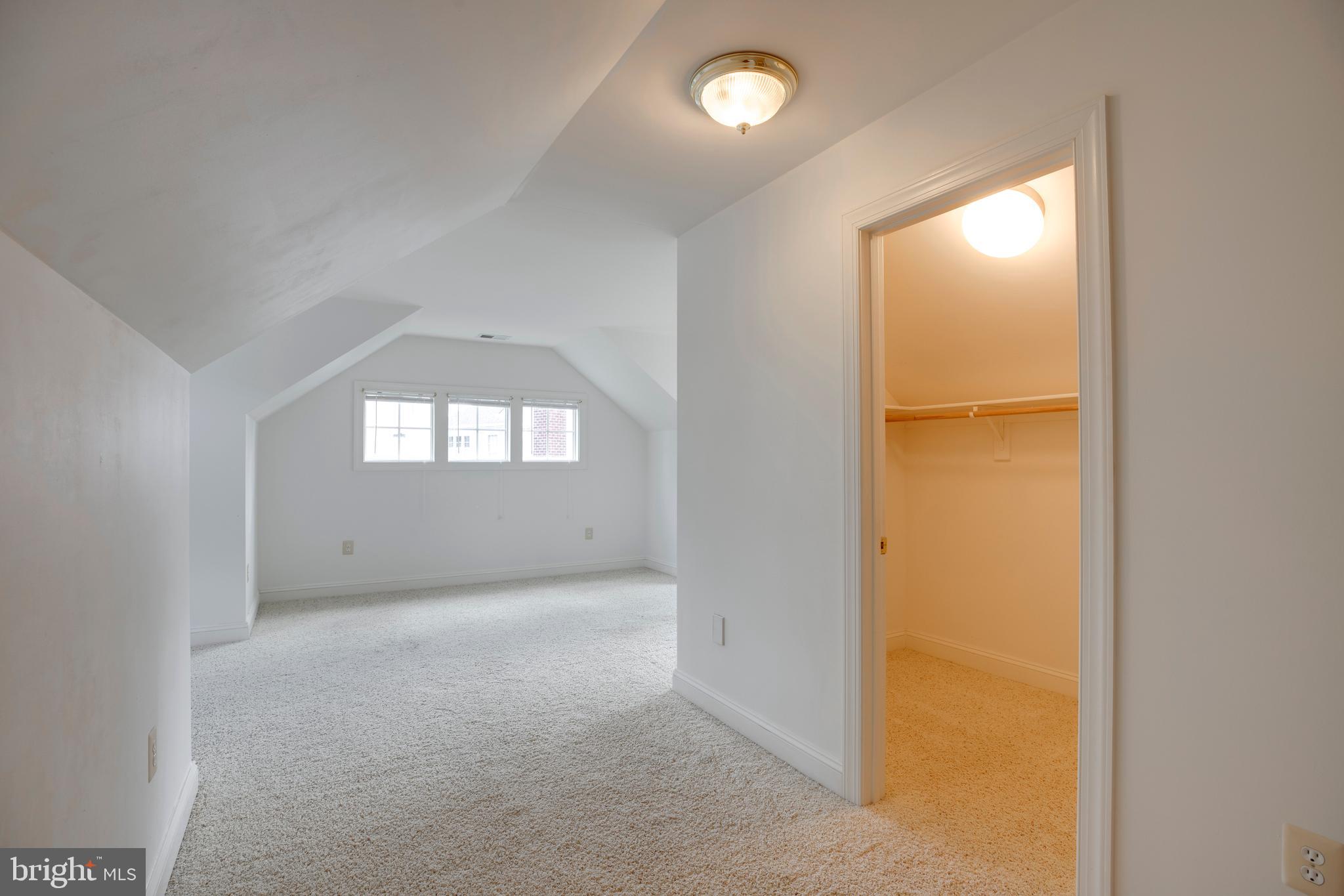 8277 Roxborough Loop Gainesville, VA 20155 - Photo 47 of 85 an empty room with windows and closet