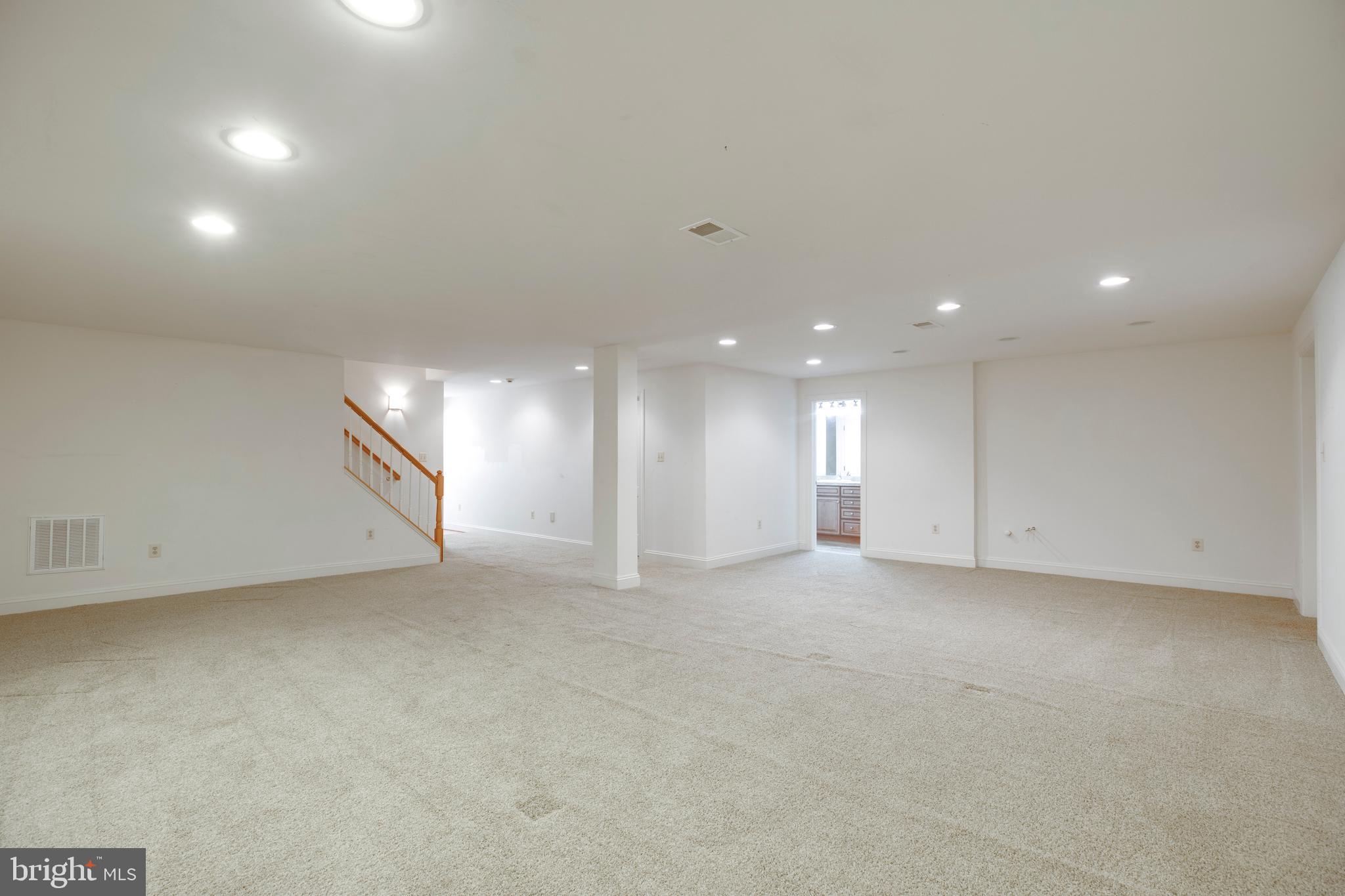 8277 Roxborough Loop Gainesville, VA 20155 - Photo 56 of 85 an empty room with window and pillar in it